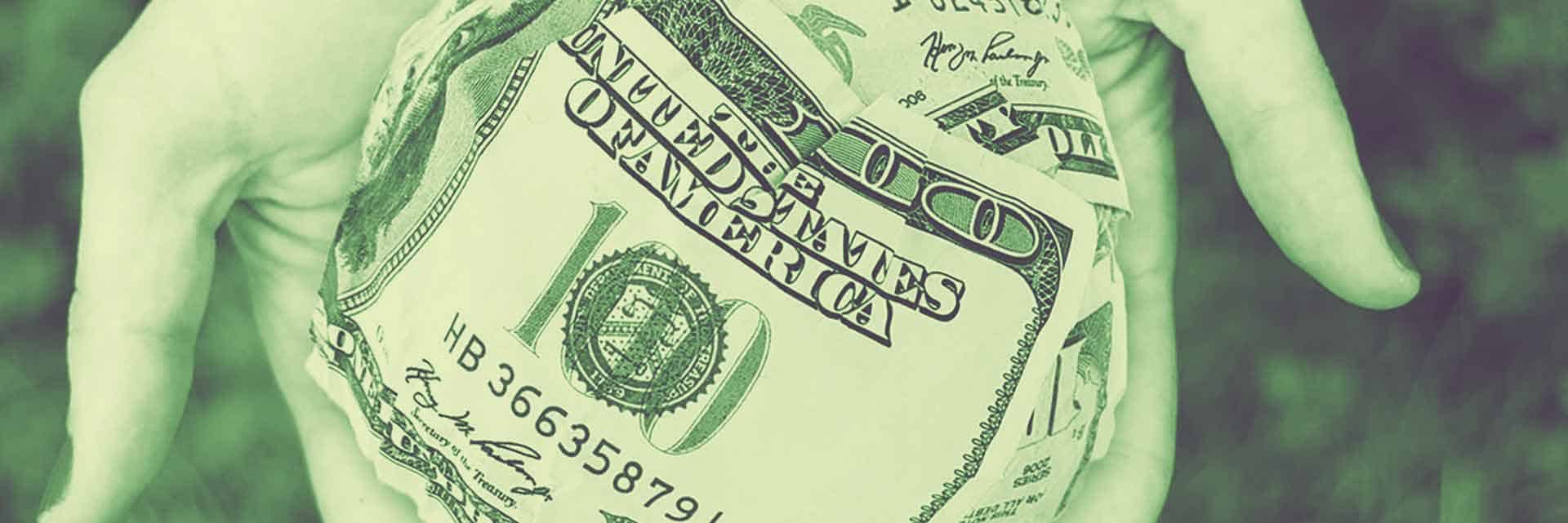 crumpled $100 bill