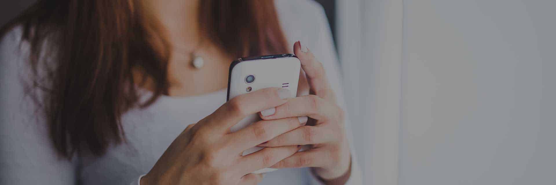 woman using smartphone
